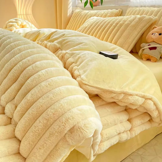 This quilt set is a sunlit dream in buttery pastel yellow, radiating warmth and softness. Its plush, ribbed texture is both luxurious and comforting, wrapping the bed in layers of a velvety plush cushion. The set includes pillow cases and a thick quilt cover, all with a uniform ribbed pattern that enhances its inviting appeal. Paired with warm lighting, soft curtains, the room feels cheerful yet serene, perfect for creating a cosy, happy retreat.

Set Includes

Quilt cover 200cm x 230cm

Flat Sheet 23